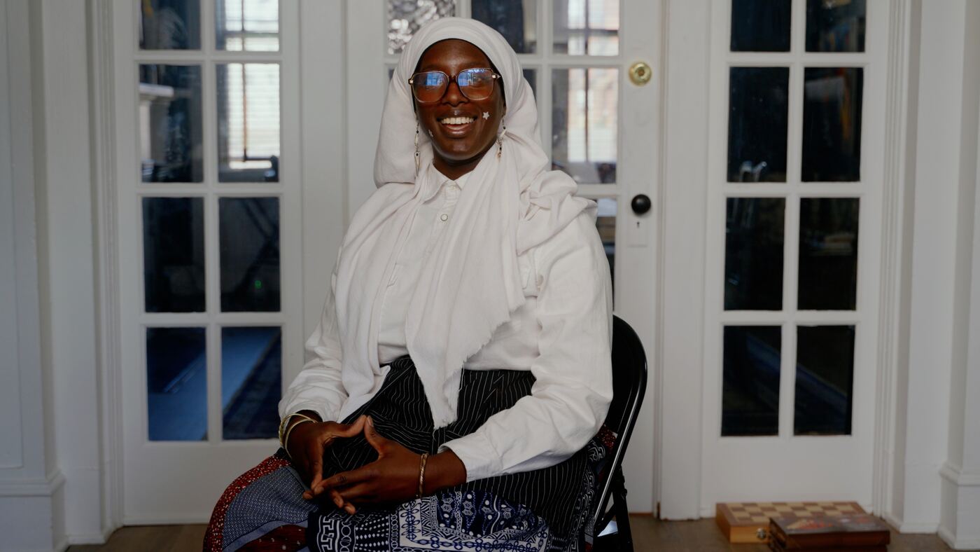 The Melanin Magic School chef seated on the porch